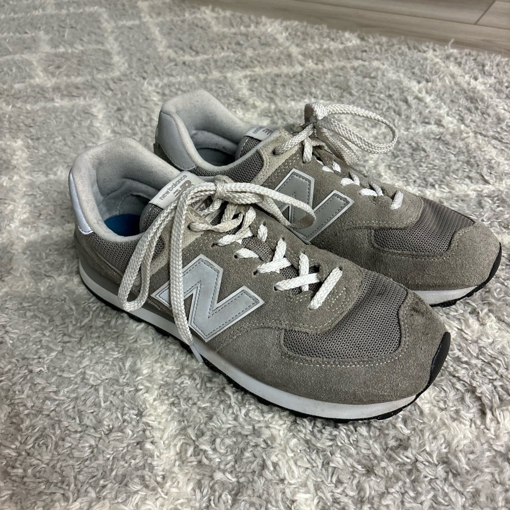Gray and White New Balance Sneakers